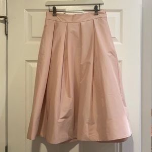 Pleated pink skirt